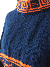 royal blue pullover with orange greek key design