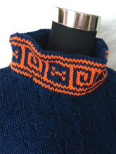 royal blue pullover with orange greek key design