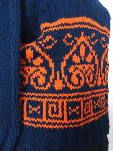 royal blue pullover with orange greek key design